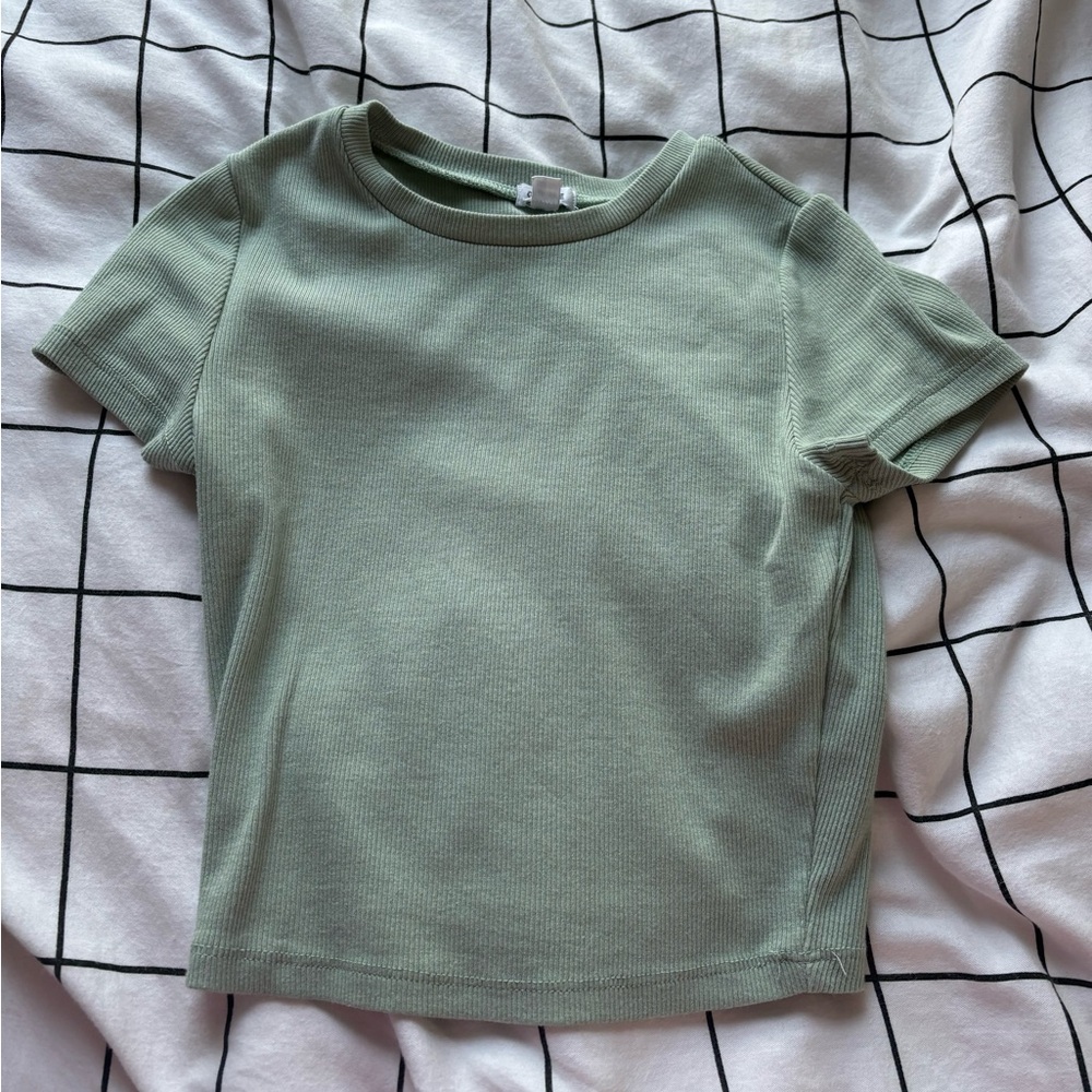 green garage shirt